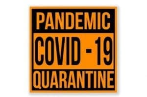 A black and orange sign reading “Pandemic COVID-19 Quarantine”.